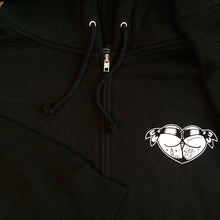 Load image into Gallery viewer, zipper close up on black mens hoodie with tattoo style butt heart logo.