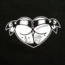 Load image into Gallery viewer, Tattoo style butt heart logo on black shirt.