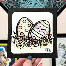 Load image into Gallery viewer, American traditional tattoo flash illustration Easter Eggs in grass and flowers watercolor painting.
