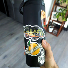 Load image into Gallery viewer, American traditional tattoo flash Peacock Bass watercolor sticker on water bottle.
