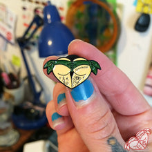 Load image into Gallery viewer, Butt heart green enamel pin.
