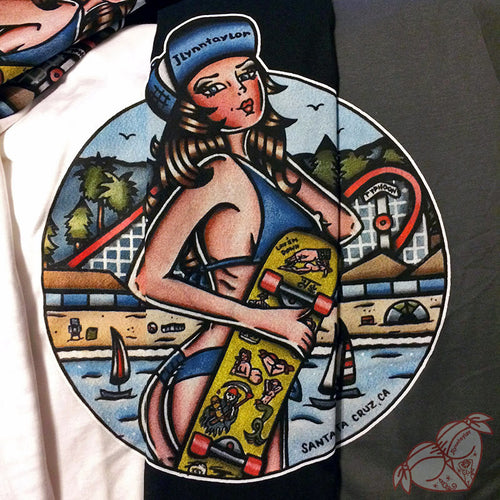 Tattoo style skateboard pinup print on three different colored shirts.