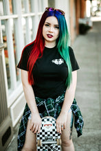 Load image into Gallery viewer, Female model wearing tattoo style butt heart logo t-shirt.
