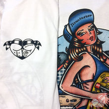 Load image into Gallery viewer, Tattoo style skateboard pinup and butt heart designs on white shirt.
