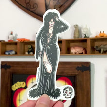 Load and play video in Gallery viewer, American traditional tattoo flash Gothic Elvira Mistress of the Dark  Pinup sticker.
